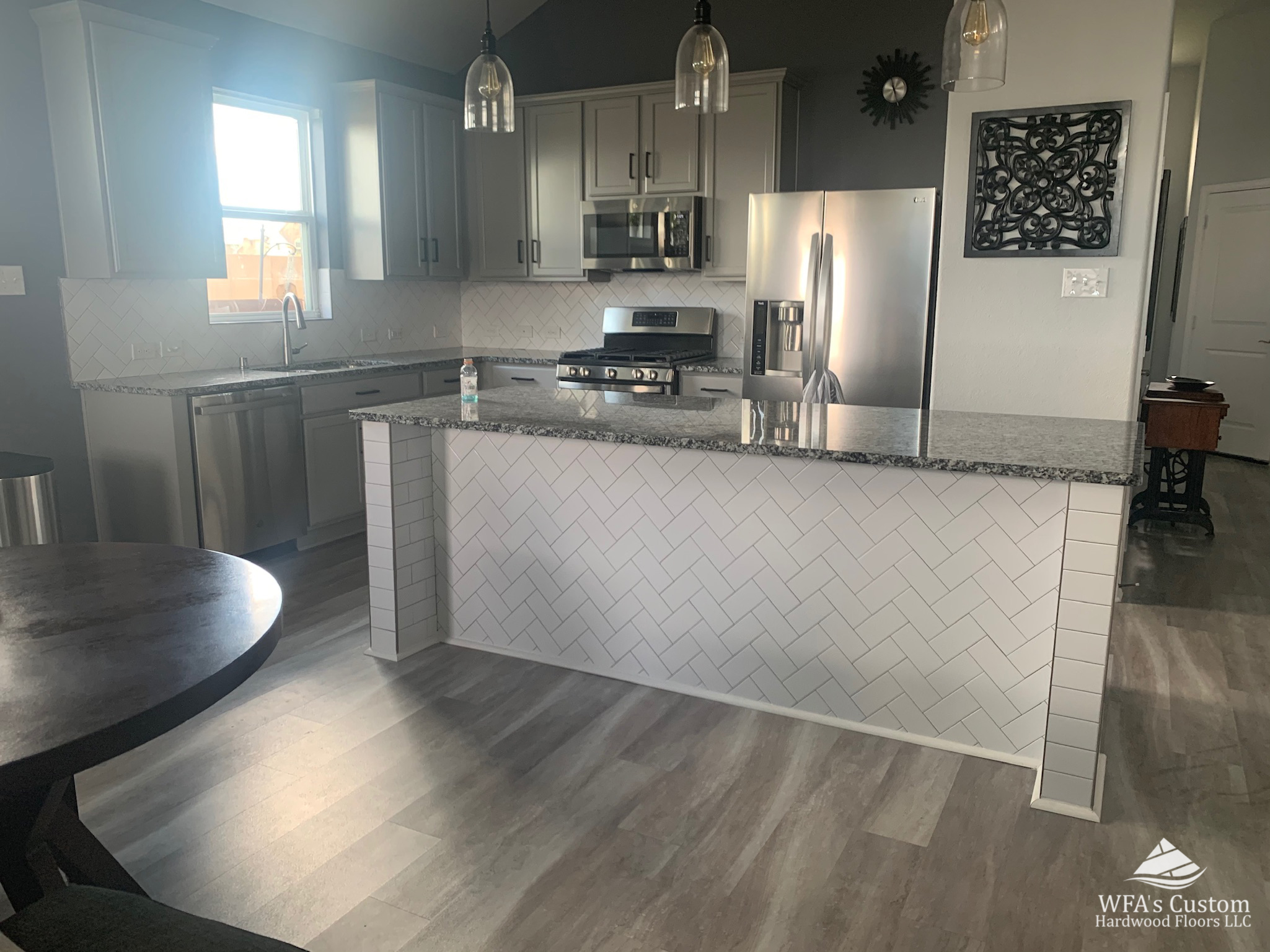 white herringbone backsplash island installation, wfa's custom hardwood floors, houston texas